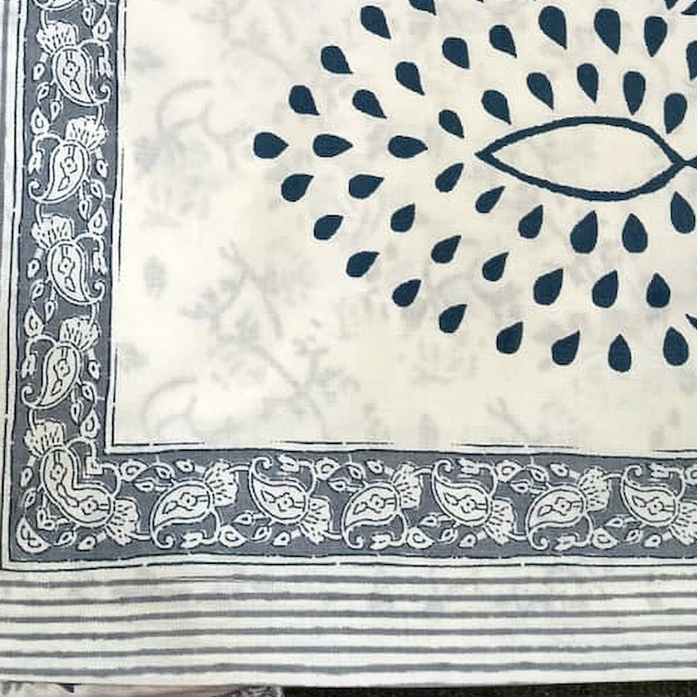 Close-up of The Silverleaf: large grey leaf motifs on white with a patterned grey border.
